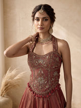 Rust red silk lehenga choli with intricate aabla embroidery