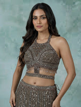 Dark mehendi green silk lehenga choli with diamond embellishments