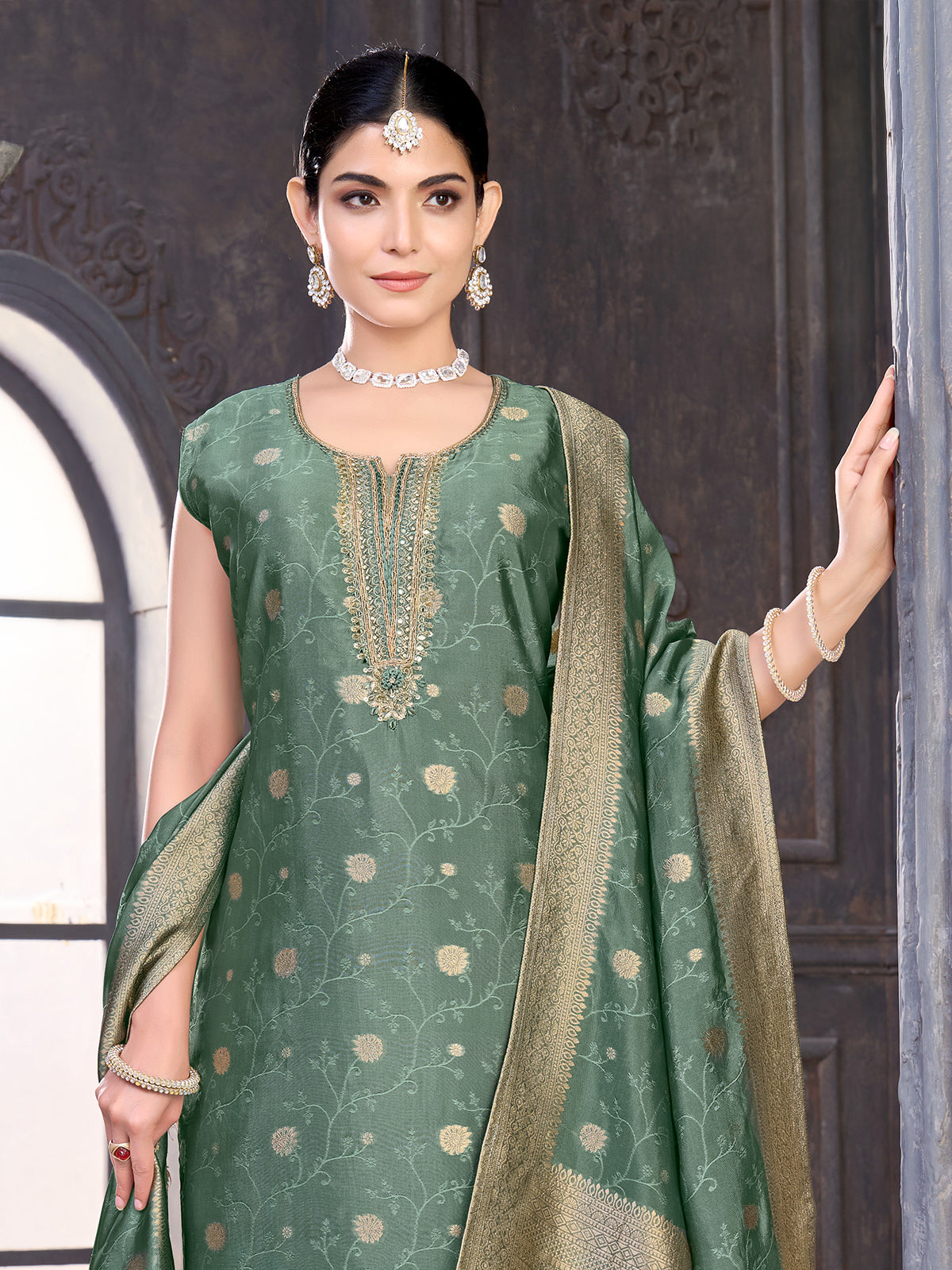 Green silk salwar suit with zardosi, aabla and diamond embellishments