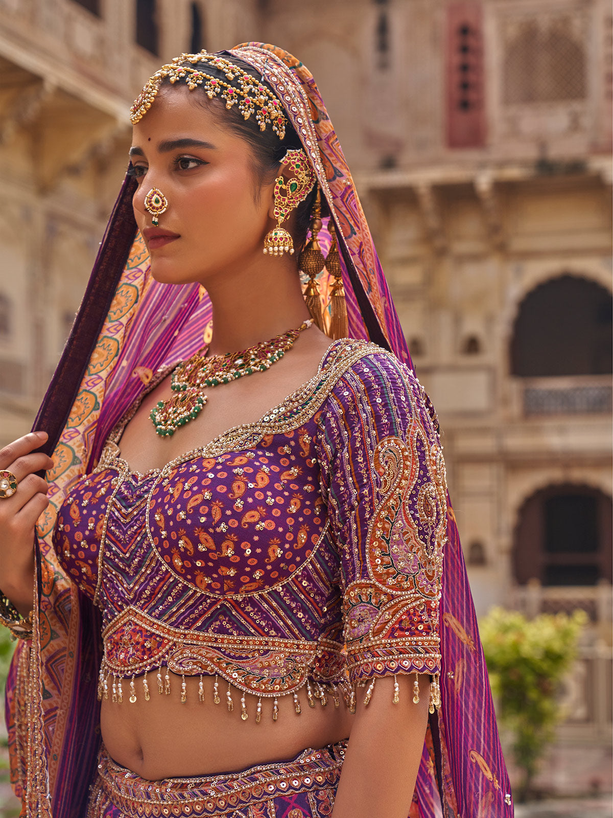 Purple mughal arch patterned women bridal lehenga choli