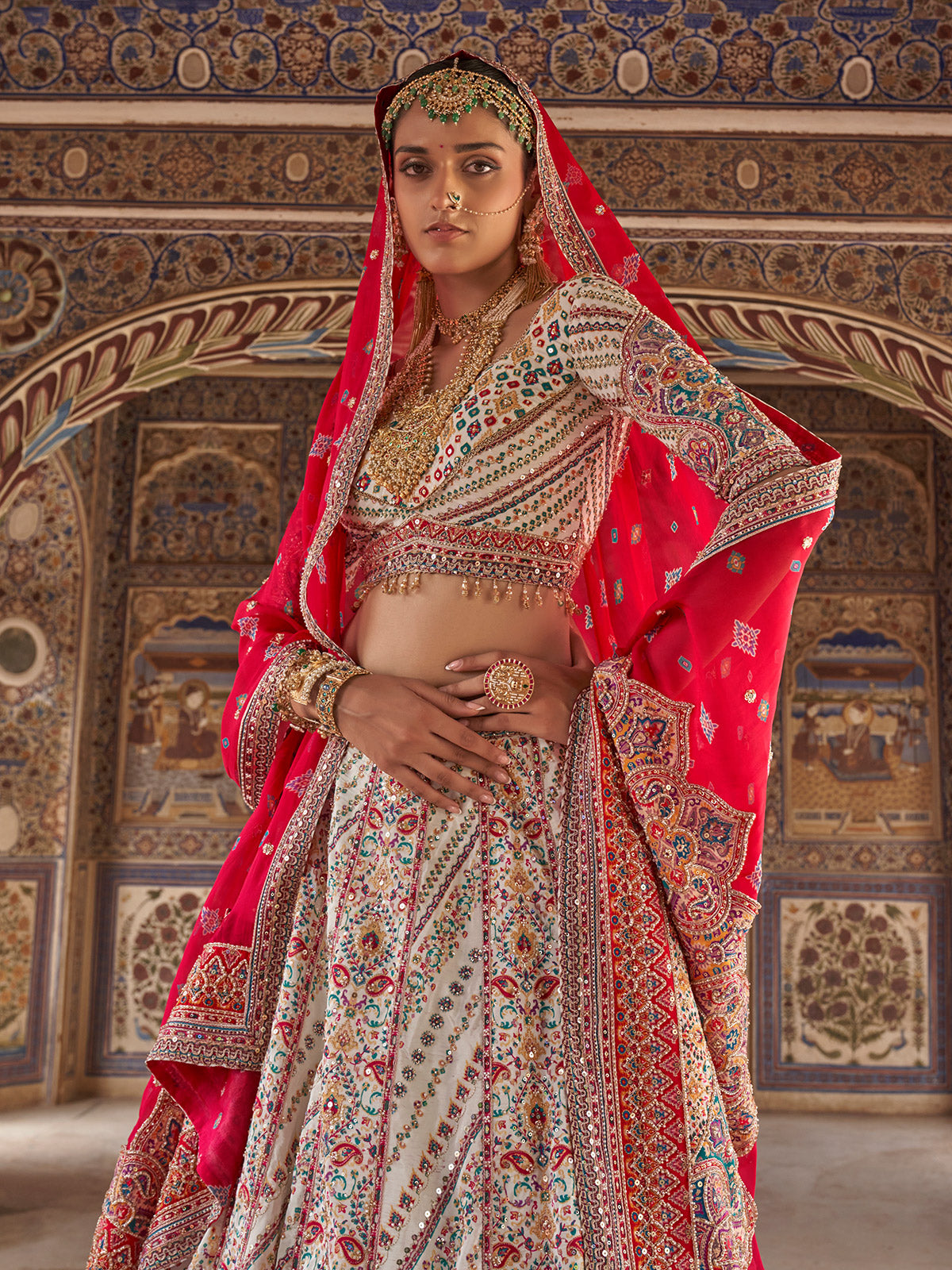 White patola inspired women bridal lehenga choli