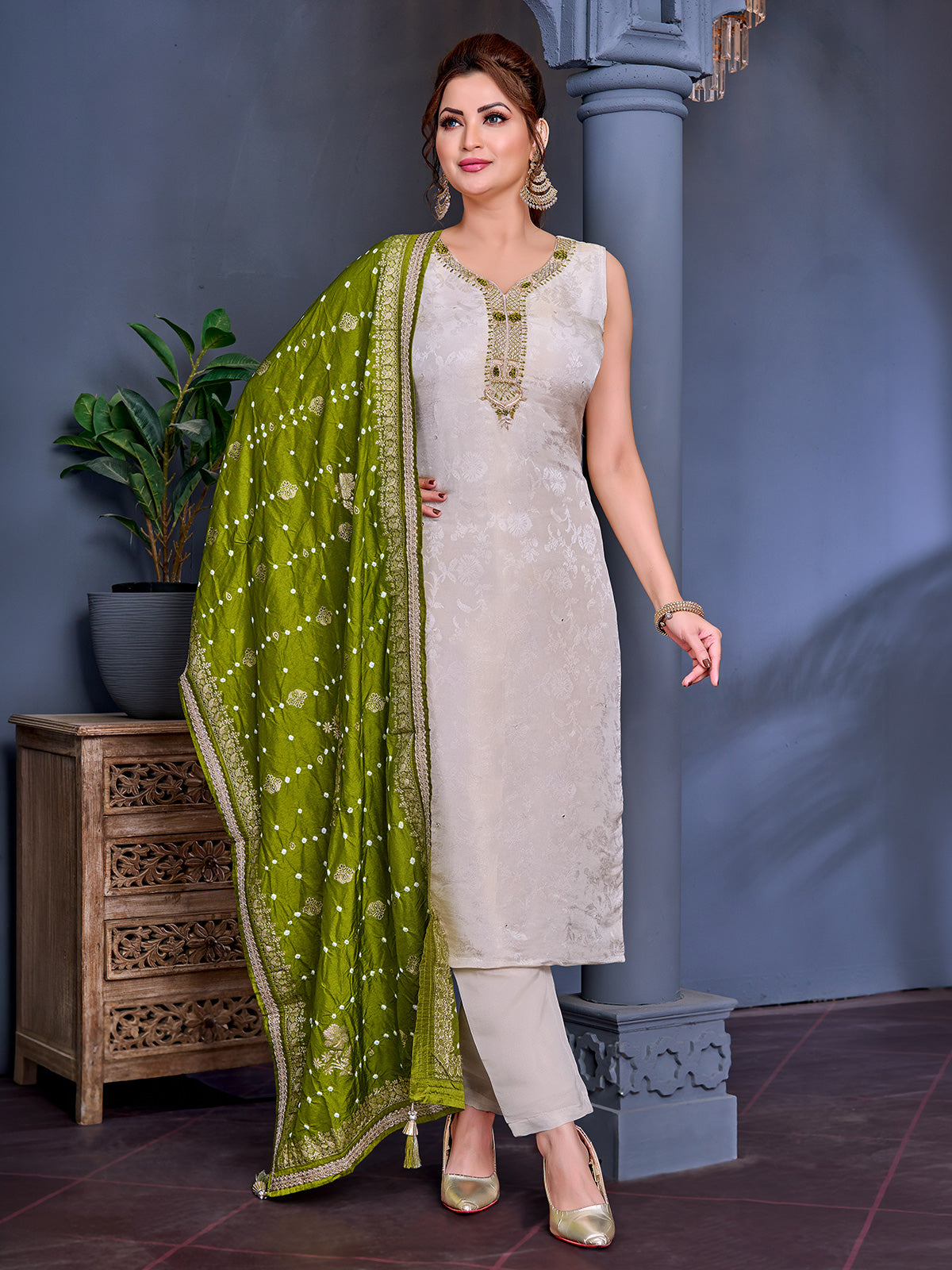 Beige shimmer salwar suit with mehendi dupatta and zardosi work