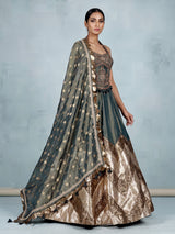 Pastel green silk lehenga choli with aabla and stone detailing