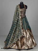 Pastel green silk lehenga choli with aabla and stone detailing