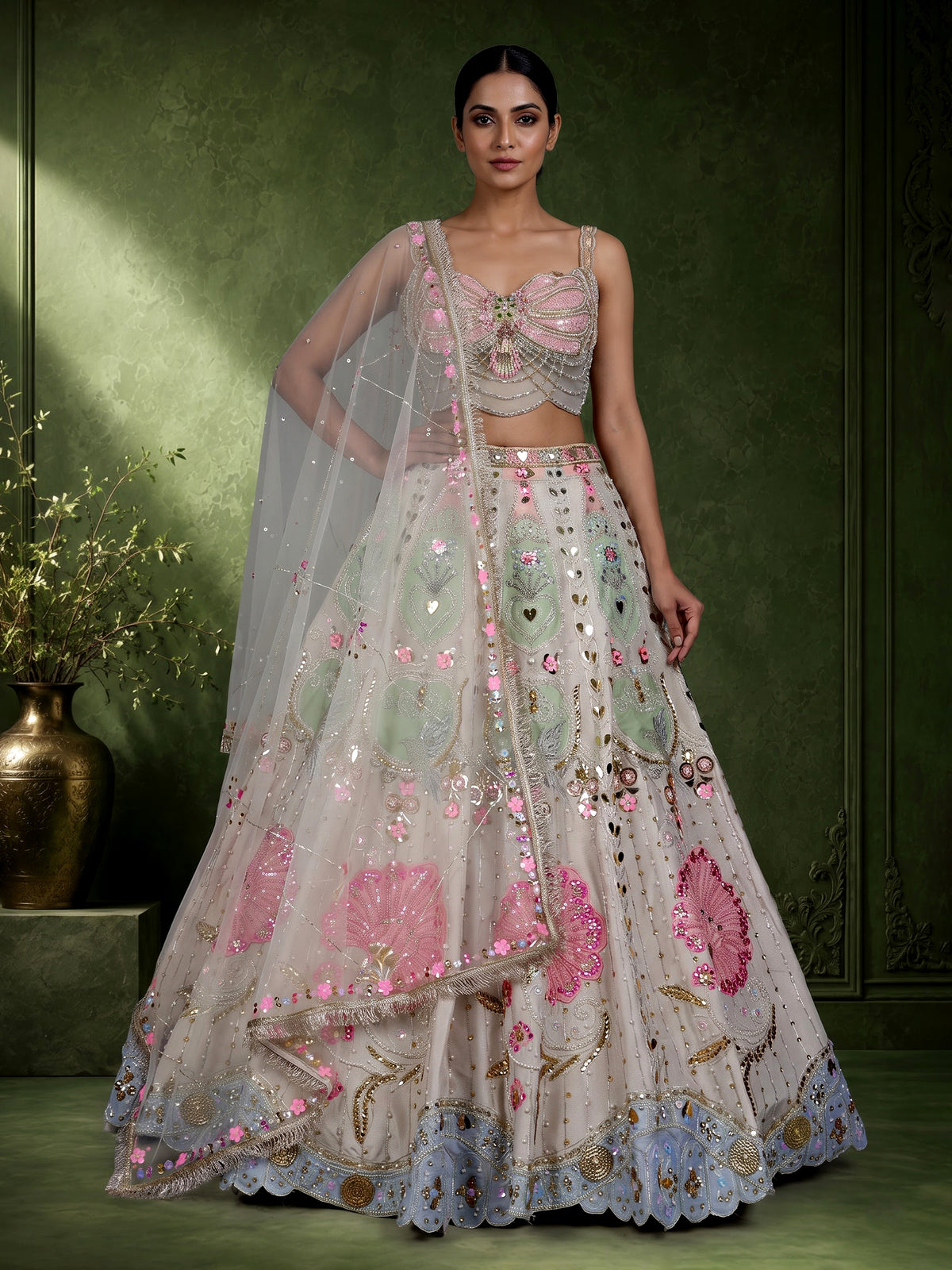 Beige silk lehenga choli with pearl and diamond embellishments
