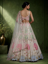Beige silk lehenga choli with pearl and diamond embellishments