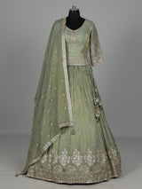 Pista green silk lehenga choli with sparkling zardosi embellishments