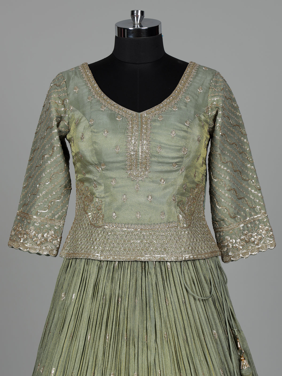Pista green silk lehenga choli with sparkling zardosi embellishments