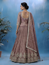 Pastel purple silk lehenga choli with intricate zardosi work
