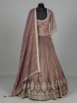 Pastel purple silk lehenga choli with intricate zardosi work