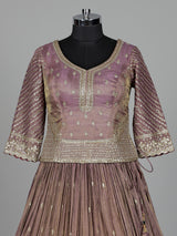 Pastel purple silk lehenga choli with intricate zardosi work