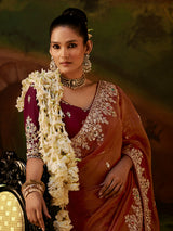 Rust orange floral tissue silk women saree