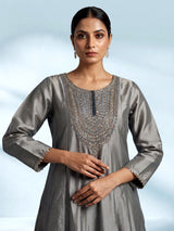 Elegant silver silk anarkali suit with zardosi embellished yoke