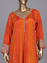 Rust orange modal silk anarkali suit with embroidered neckline