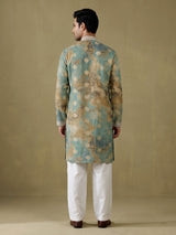 Sea green silk kurta suit with mirror work embroidered neckline