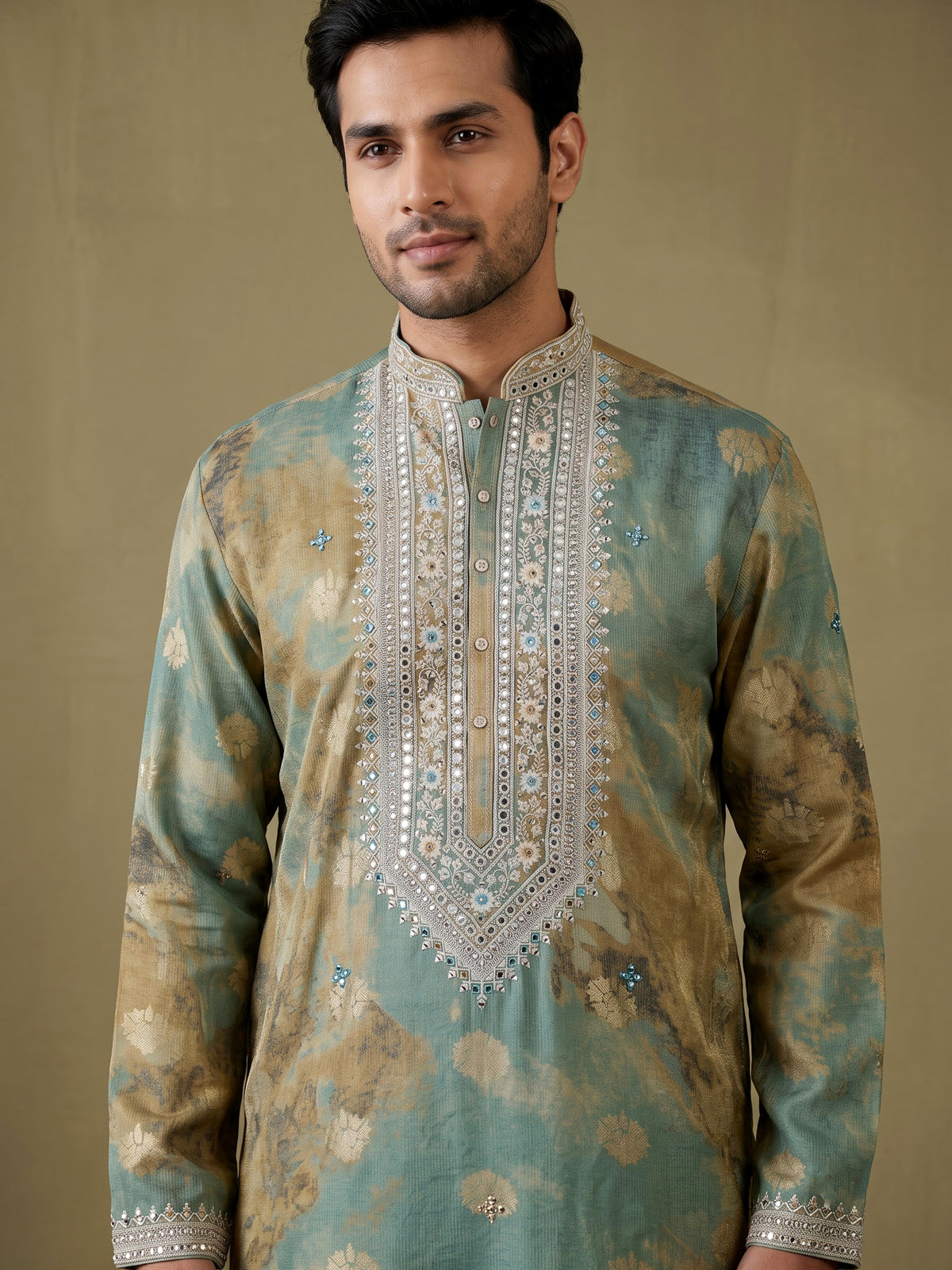 Sea green silk kurta suit with mirror work embroidered neckline