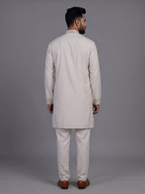 Off white short kurta suit with gold embroidered bib