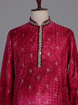 Rani pink bandhani silk kurta suit with mirror work detailing