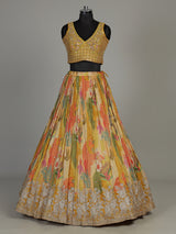Mustard yellow floral silk lehenga choli with designer embellishments