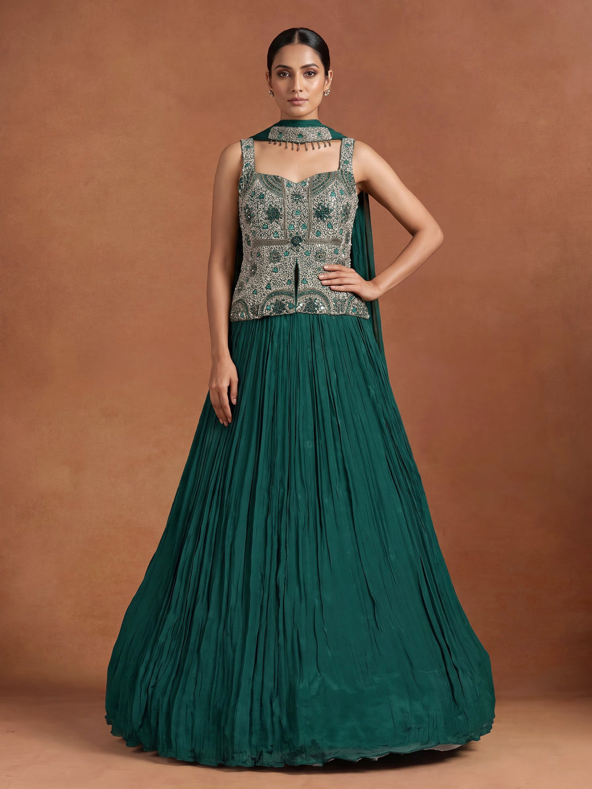 Green chiffon silk lehenga choli with exquisite zardosi embellishments