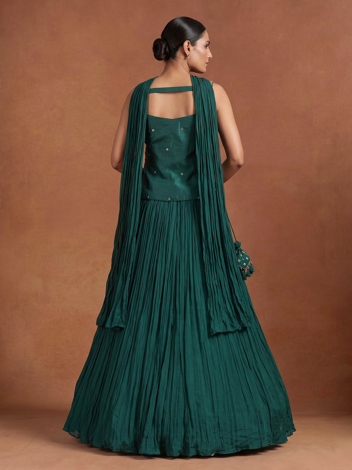 Green chiffon silk lehenga choli with exquisite zardosi embellishments