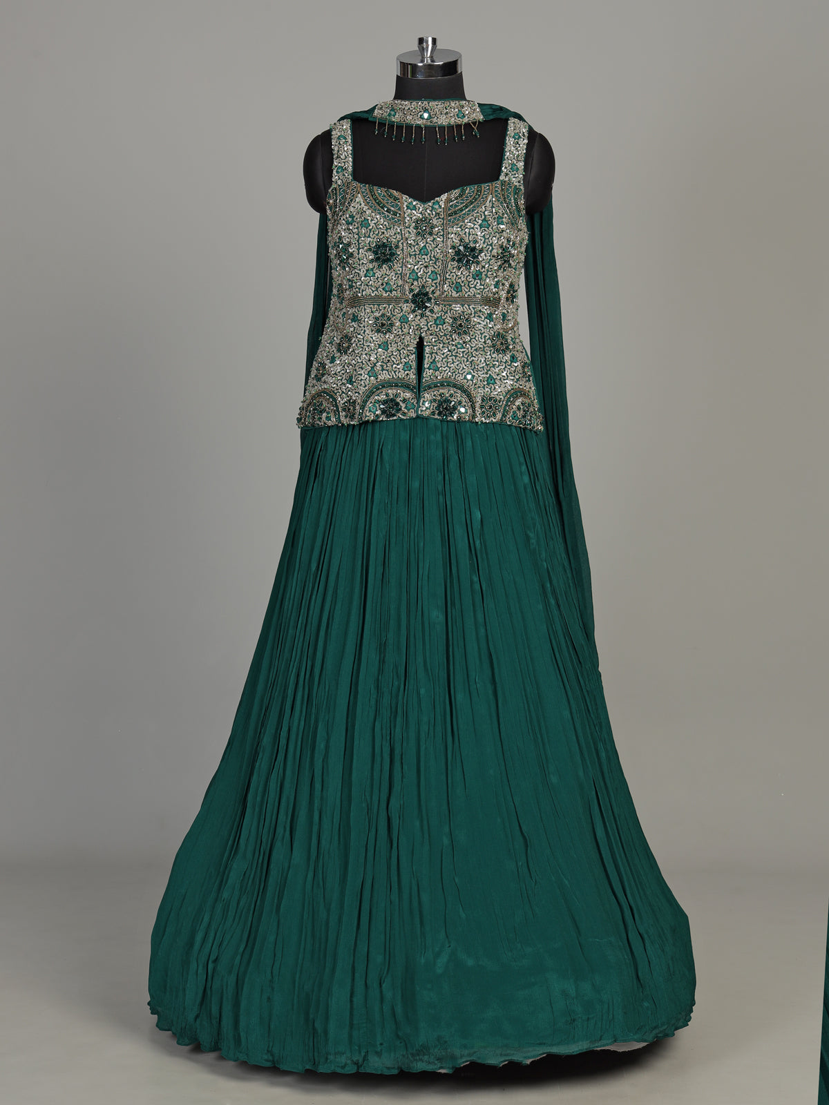 Green chiffon silk lehenga choli with exquisite zardosi embellishments