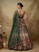 Green silk floral lehenga choli with halter neck embellishments