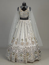 White net designer lehenga choli with sparkling diamond embellishments