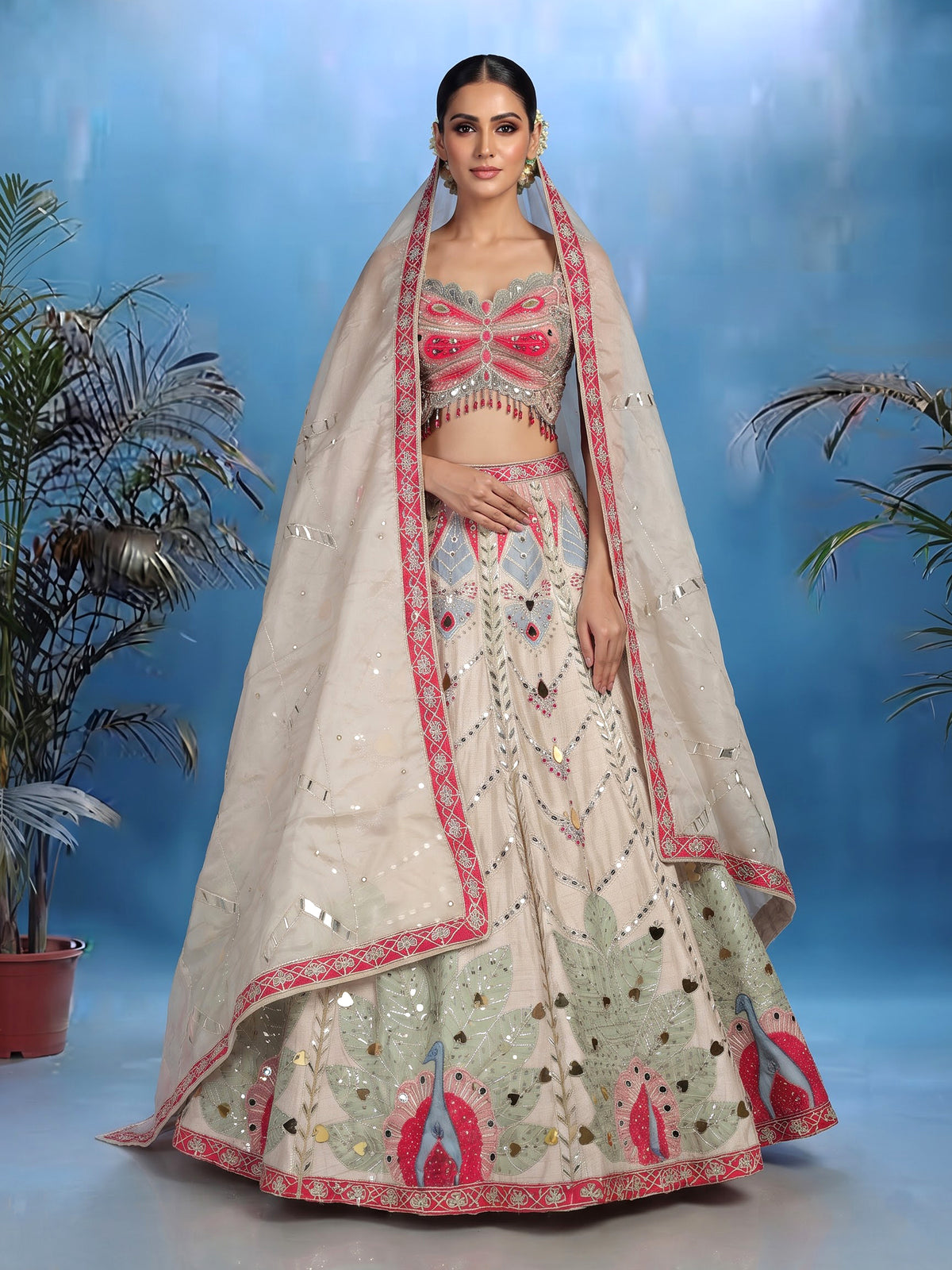 Beige raw silk peacock motif lehenga choli with mirror embellishments