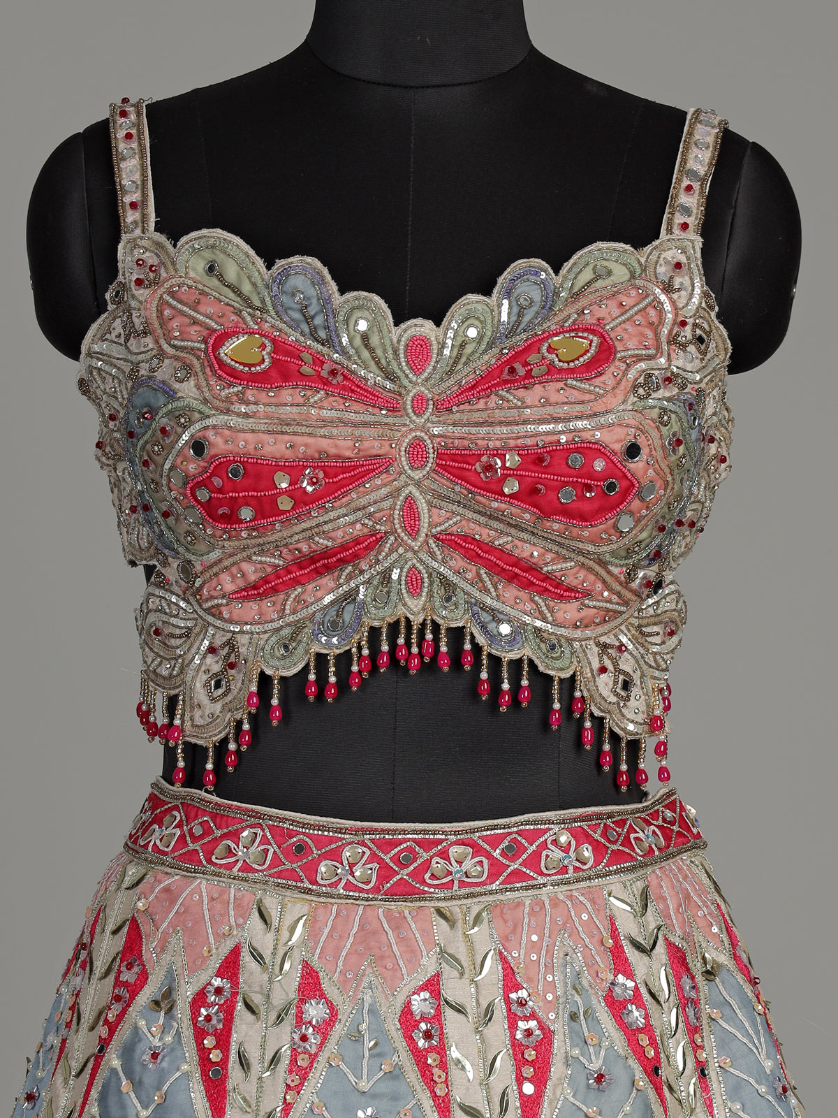 Beige raw silk peacock motif lehenga choli with mirror embellishments