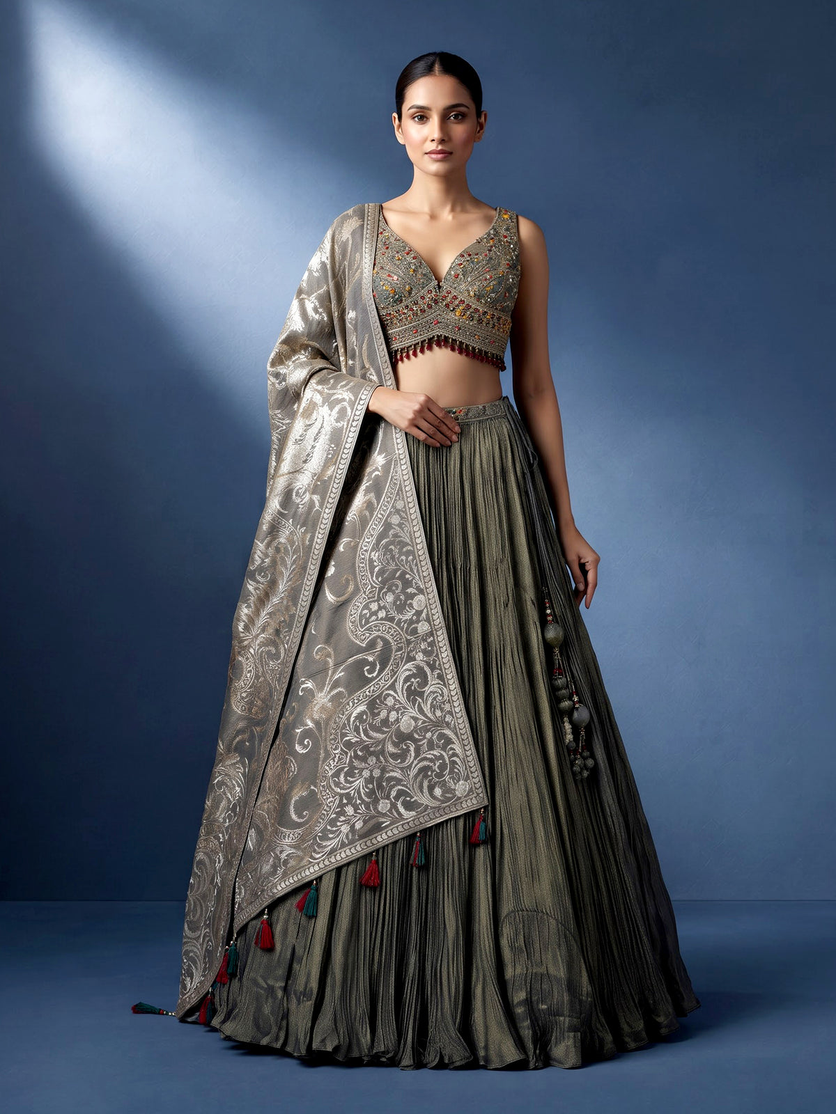 Pastel mehendi green silk lehenga choli with pearl embellishments