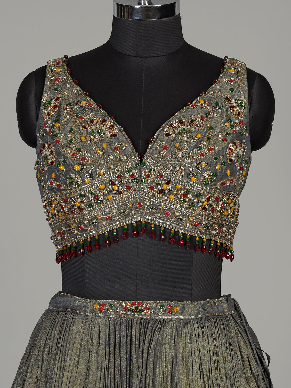 Pastel mehendi green silk lehenga choli with pearl embellishments