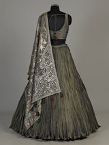 Pastel mehendi green silk lehenga choli with pearl embellishments