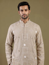 Beige linen kurta suit with floral thread embellishments