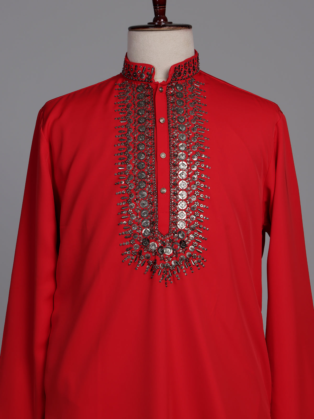 Scarlet red crepe silk kurta suit with antique silver embellished bib