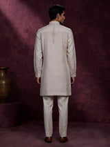 Fawn beige linen kurta suit with geometric chevron embroidered detailing