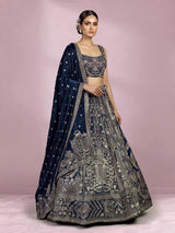 Teal blue silk lehenga choli with square neck zari embellishments