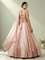 Peach silk lehenga choli with exquisite mirror zari embellishments