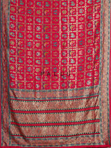 Deep rani pink modal satin saree with colourful motifs and embellishments