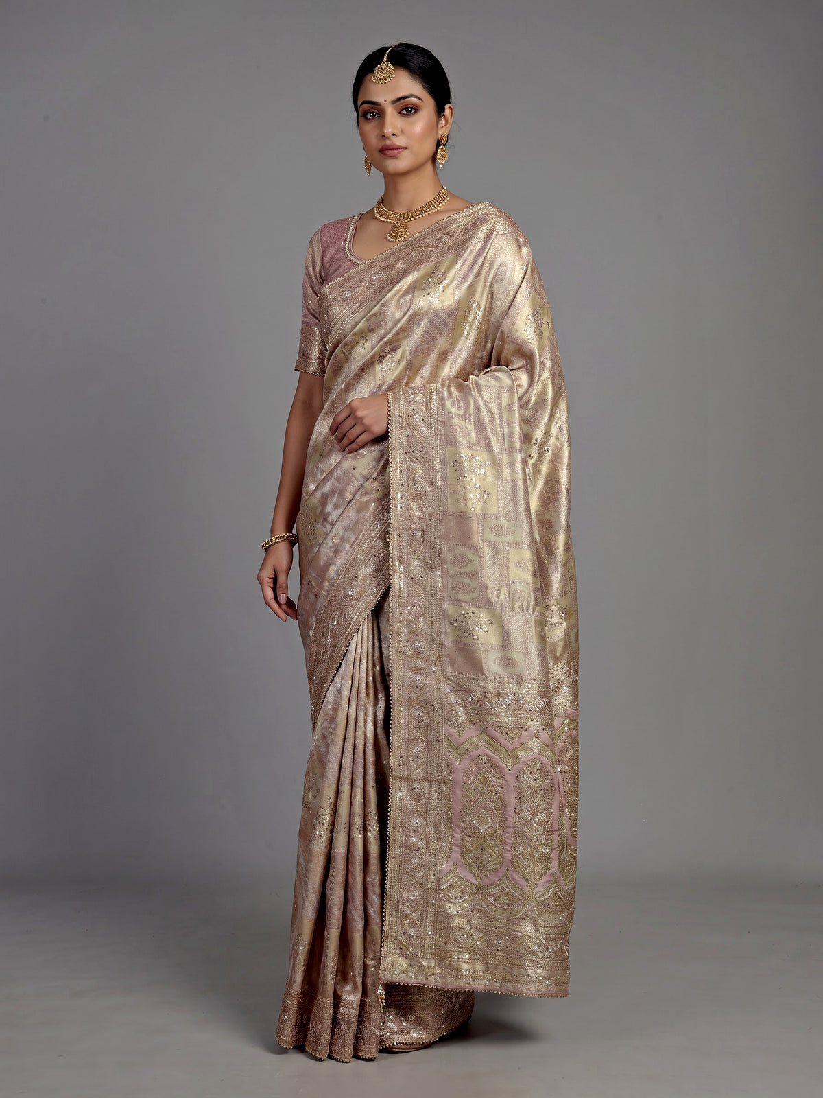 Lavender purple tissue silk saree with detailed zardosi and zari embellishments