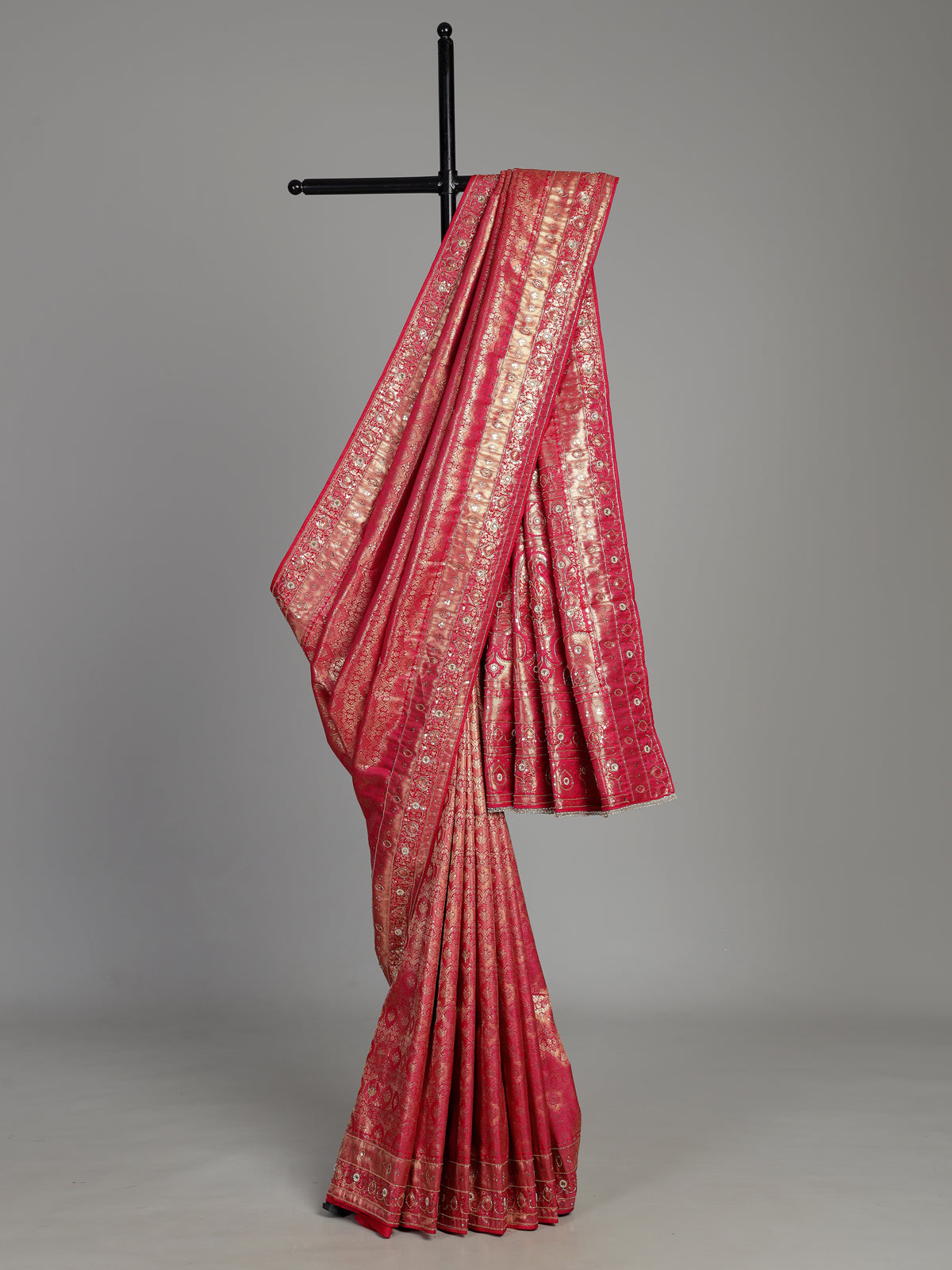 Rani pink tissue silk saree with ornate mirror and zardosi embellishments