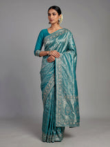 Aqua kanjivaram silk saree with ornate mirror work and zari accents