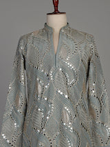 Pastel mint blue silk kurta set with embellished swirl embroidery