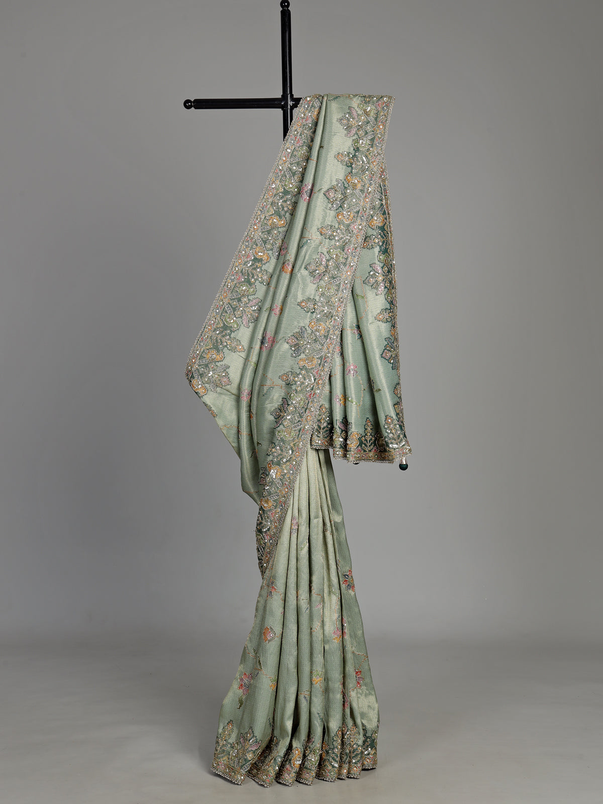 Pastel mint green pashmina saree with floral and bird embroidery