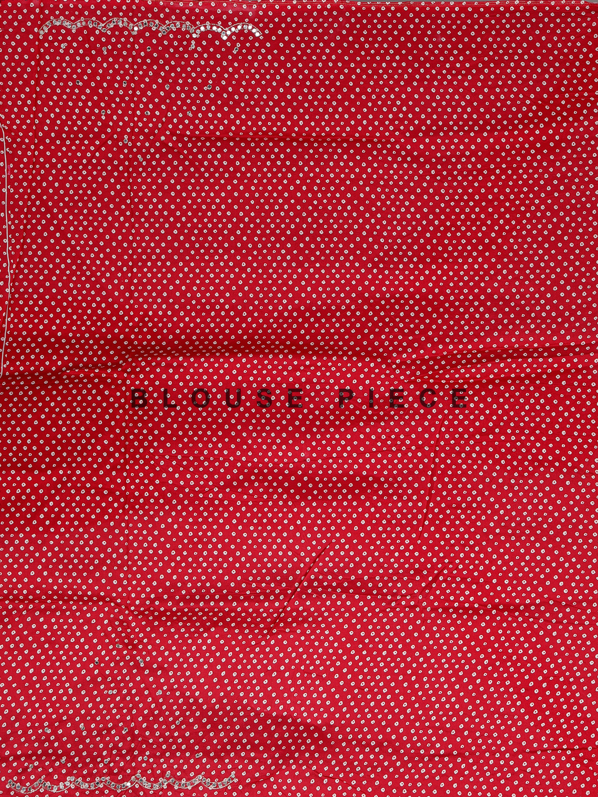 Red muslin silk saree with bandhani print and traditional aabla embellishments