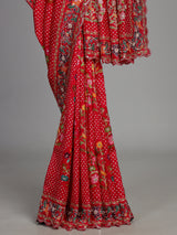 Red muslin silk saree with bandhani print and traditional aabla embellishments