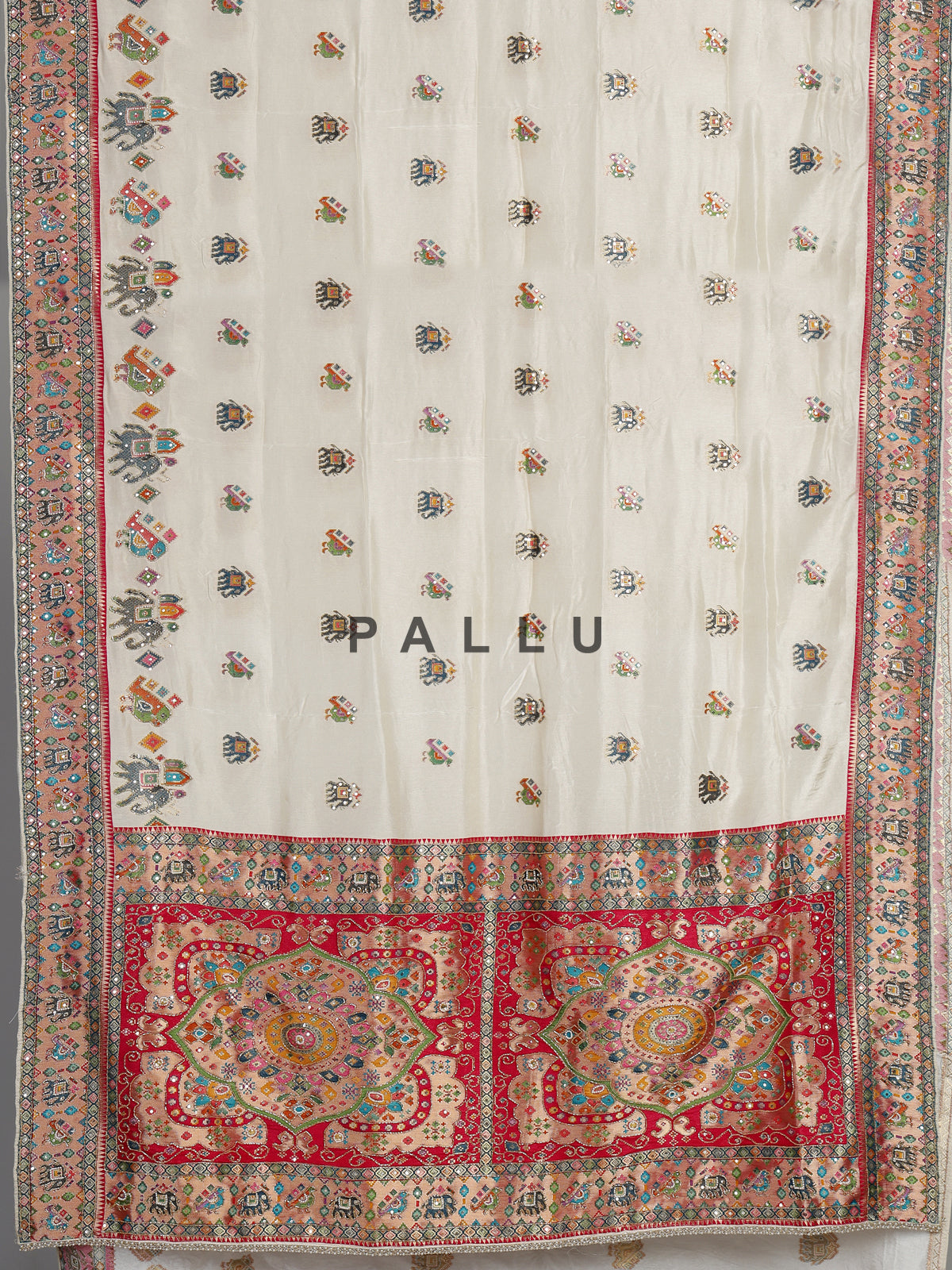 Cream pashmina saree with elephant and bird motifs and zari