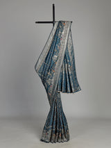 Teal blue semi silk saree with artistic animal and bird motifs