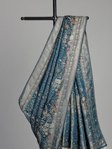 Teal blue semi silk saree with artistic animal and bird motifs