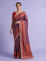 Purple semi patola silk saree with Patola print and contrasting embellished pallu
